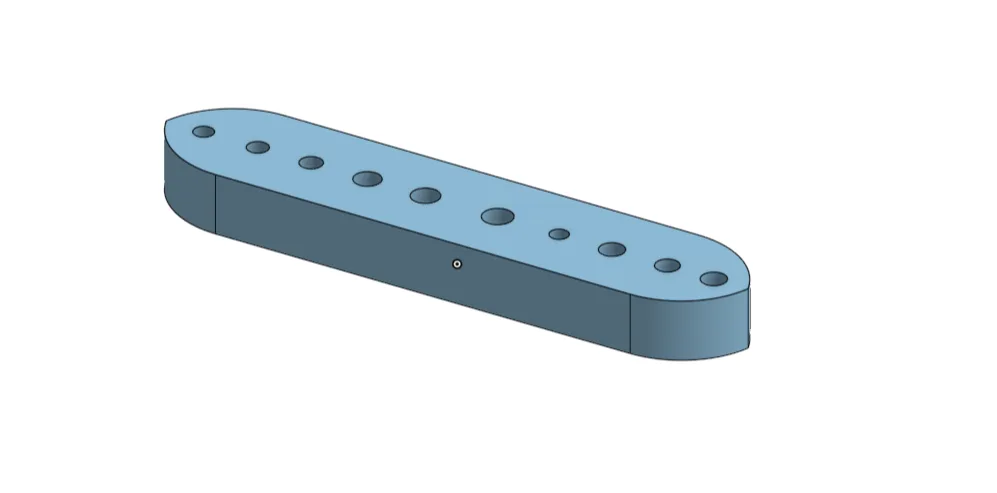 3D-printed tolerance coupon with a row of different hole sizes